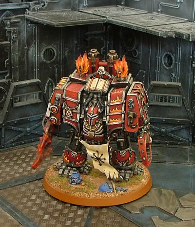This dreadnought has the head of a battle sister sitting on a rock...